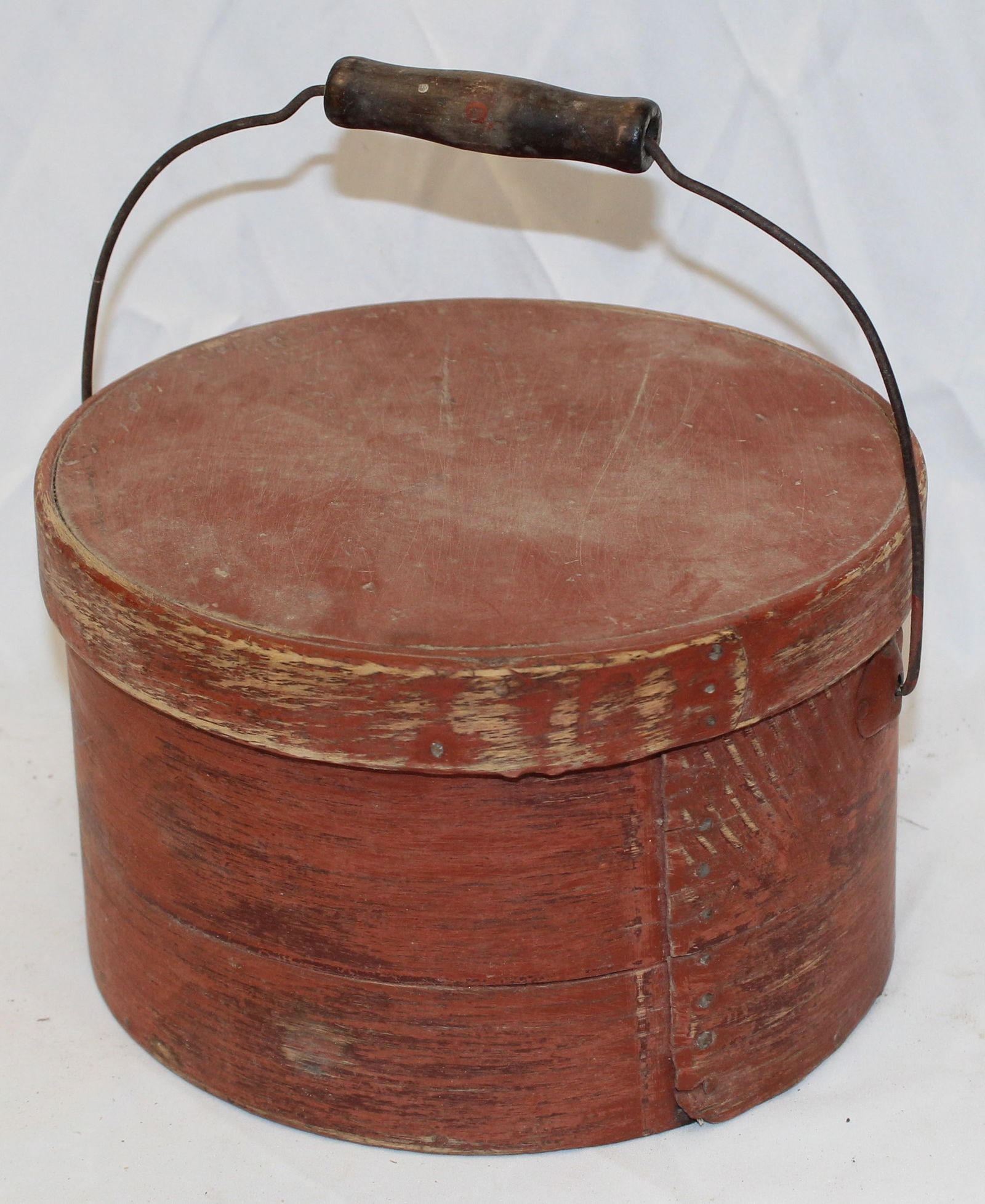 Antique bail handled pantry box in red paint - 9 1/4" diam x 5 1/2" tall: Antique bail handled pantry box in red paint - 9 1/4" diam x 5 1/2" tall