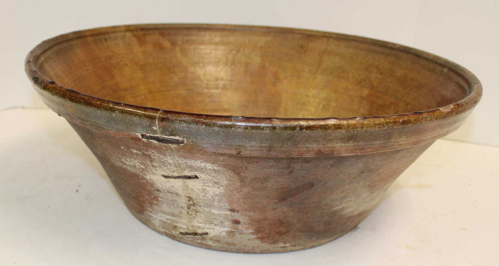 Large antique redware bowl w make do staple repairs - 6 1/2" tall x 18 1/2" diam: Large antique redware bowl w make do staple repairs - 6 1/2" tall x 18 1/2" diam