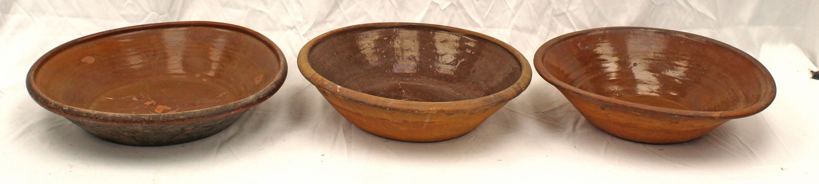 Lot of 3 antique redware milk pans - approx 3 3/4" tall x 17" diam & 4" tall x 16" diam (2): Lot of 3 antique redware milk pans - approx 3 3/4" tall x 17" diam & 4" tall x 16" diam (2)