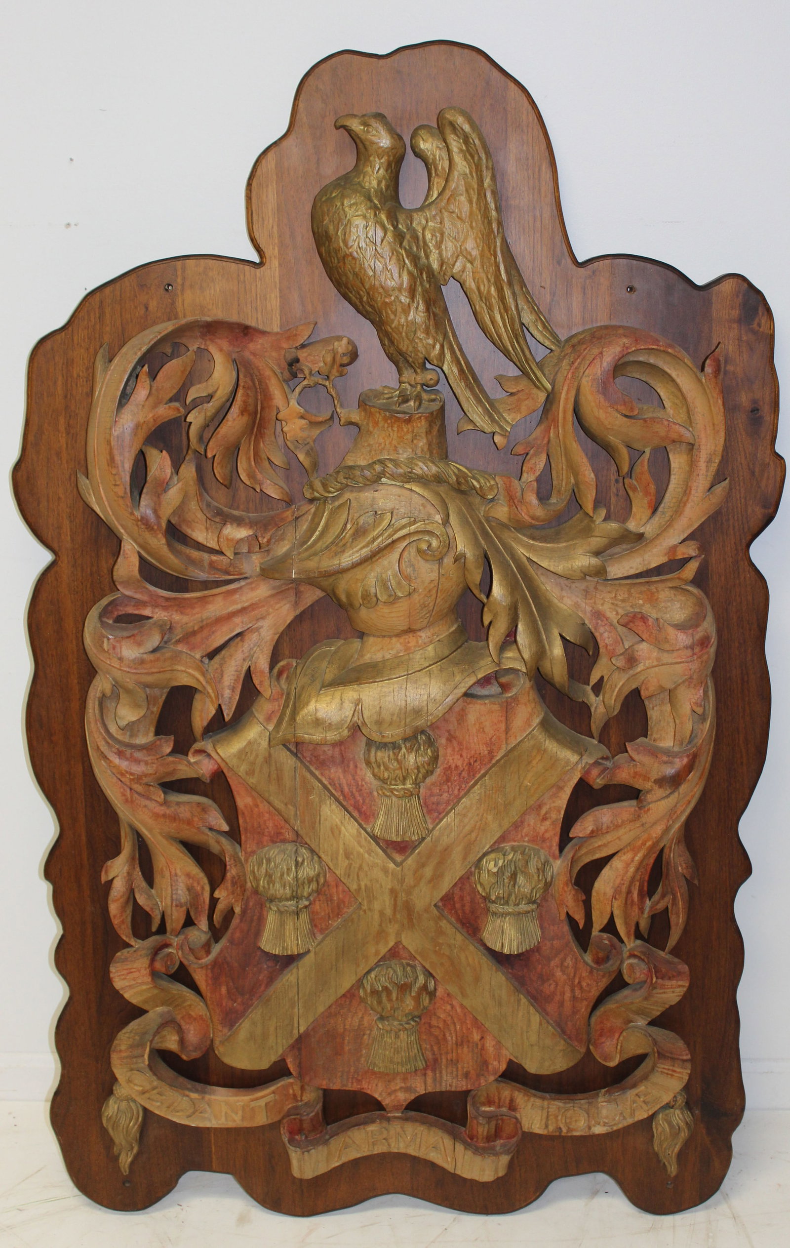Large carved wood & painted wall plaque mounted on backboard - of a hunting falcon on stump w oak: Large carved wood & painted wall plaque mounted on backboard - of a hunting falcon on stump w oak leaves & acorns, etc "Cedent Arma Togae" - 57" tall x 36" wide x 4" deep