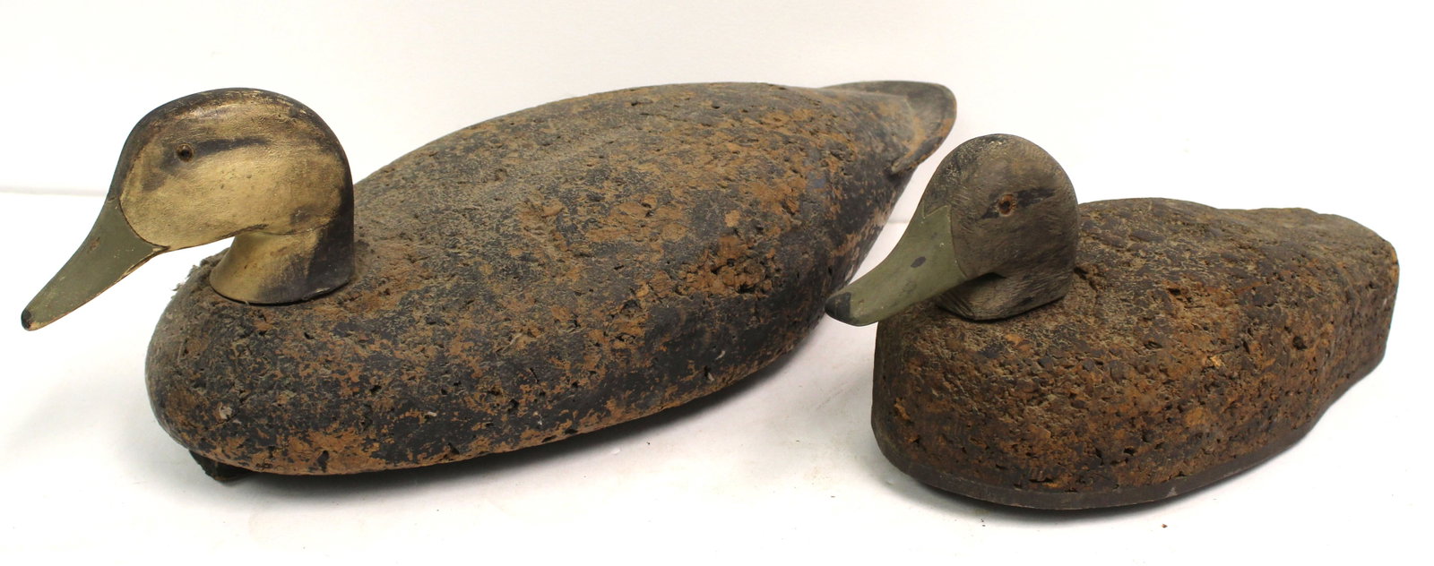 Lot of 2 cork duck decoys w wooden heads 6 1/2"x20" & 6"x14": Lot of 2 cork duck decoys w wooden heads 6 1/2"x20" & 6"x14"