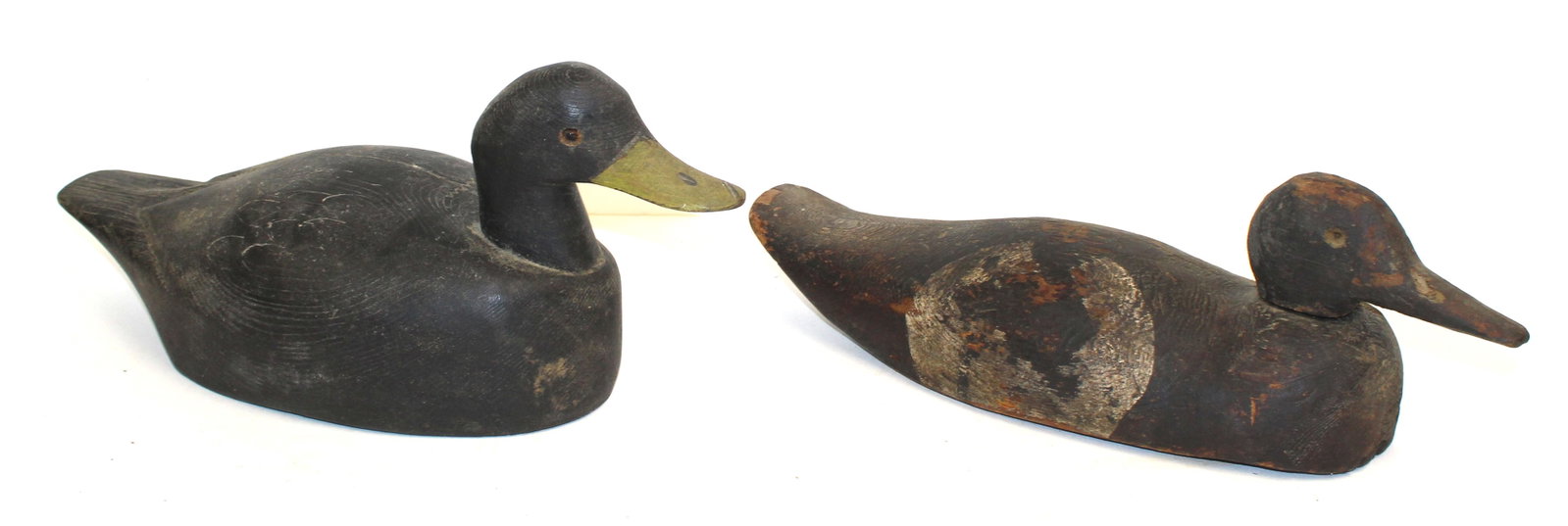Lot of 2 carved wooden duck decoys - 5"x10 1/2" & 6"x13": Lot of 2 carved wooden duck decoys - 5"x10 1/2" & 6"x13"