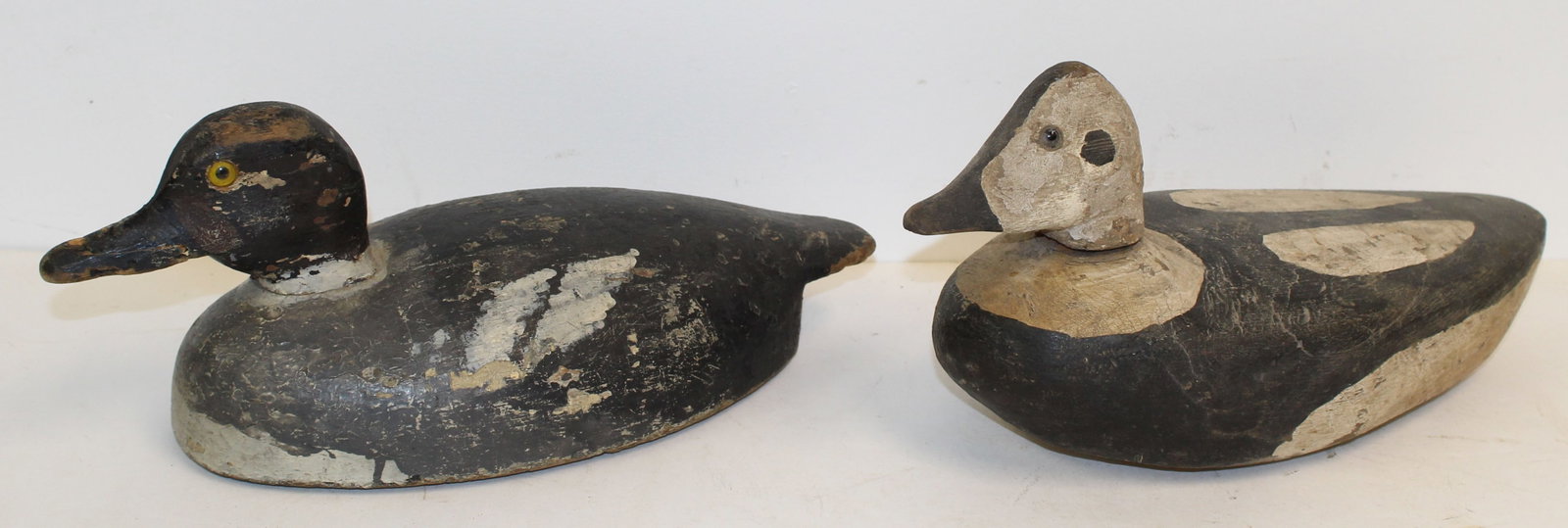 Lot of 2 carved wooden duck decoys - 6"x14" & 7"x14": Lot of 2 carved wooden duck decoys - 6"x14" & 7"x14"