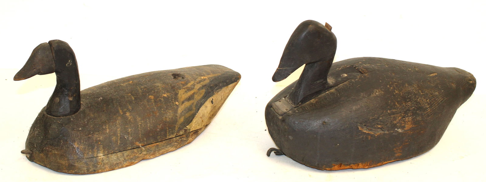 Lot of 2 carved wooden decoys - a duck & a goose - each is 8"x15": Lot of 2 carved wooden decoys - a duck & a goose - each is 8"x15"