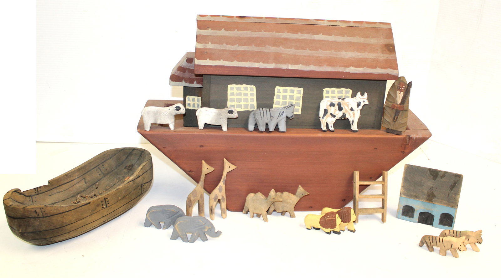 Contemporary antique style wooden painted Noah's Ark w animals & rowboat -- benchmade by the late: Contemporary antique style wooden painted Noah's Ark w animals & rowboat -- benchmade by the late owner of the Merrimac, NH estate - Ark is 14" tall x 20" long x 6 1/2" deep - rowboat is 10" long - ho