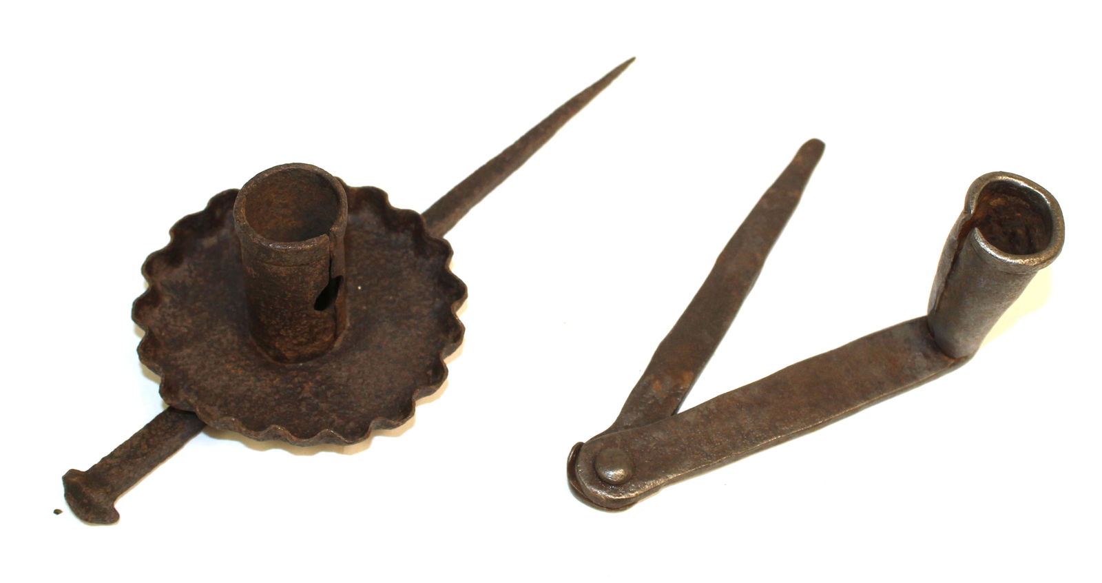 Lot of 2 iron sticking tommy candle holders incl a hinged example - 9" & 10" long: Lot of 2 iron sticking tommy candle holders incl a hinged example - 9" & 10" long