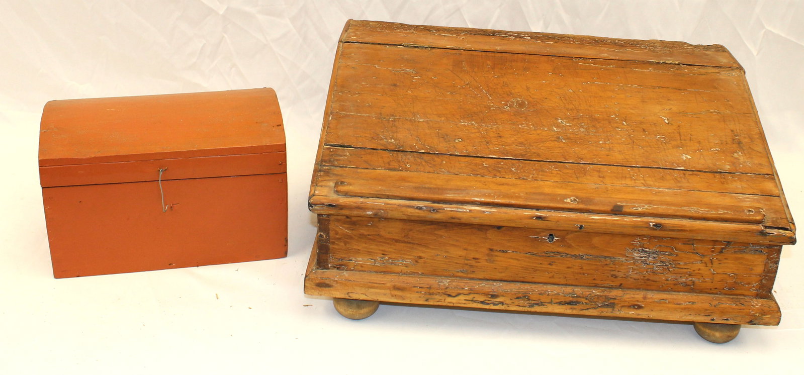 Antique table top lift top desk on ball feet (added) together with a small dome top box in later: Antique table top lift top desk on ball feet (added) together with a small dome top box in later orange paint - desk is 10" tall x 21 1/2" wide x 15 1/2" deep & box is 7 1/2" tall x 11 1/2" wide x 7" 