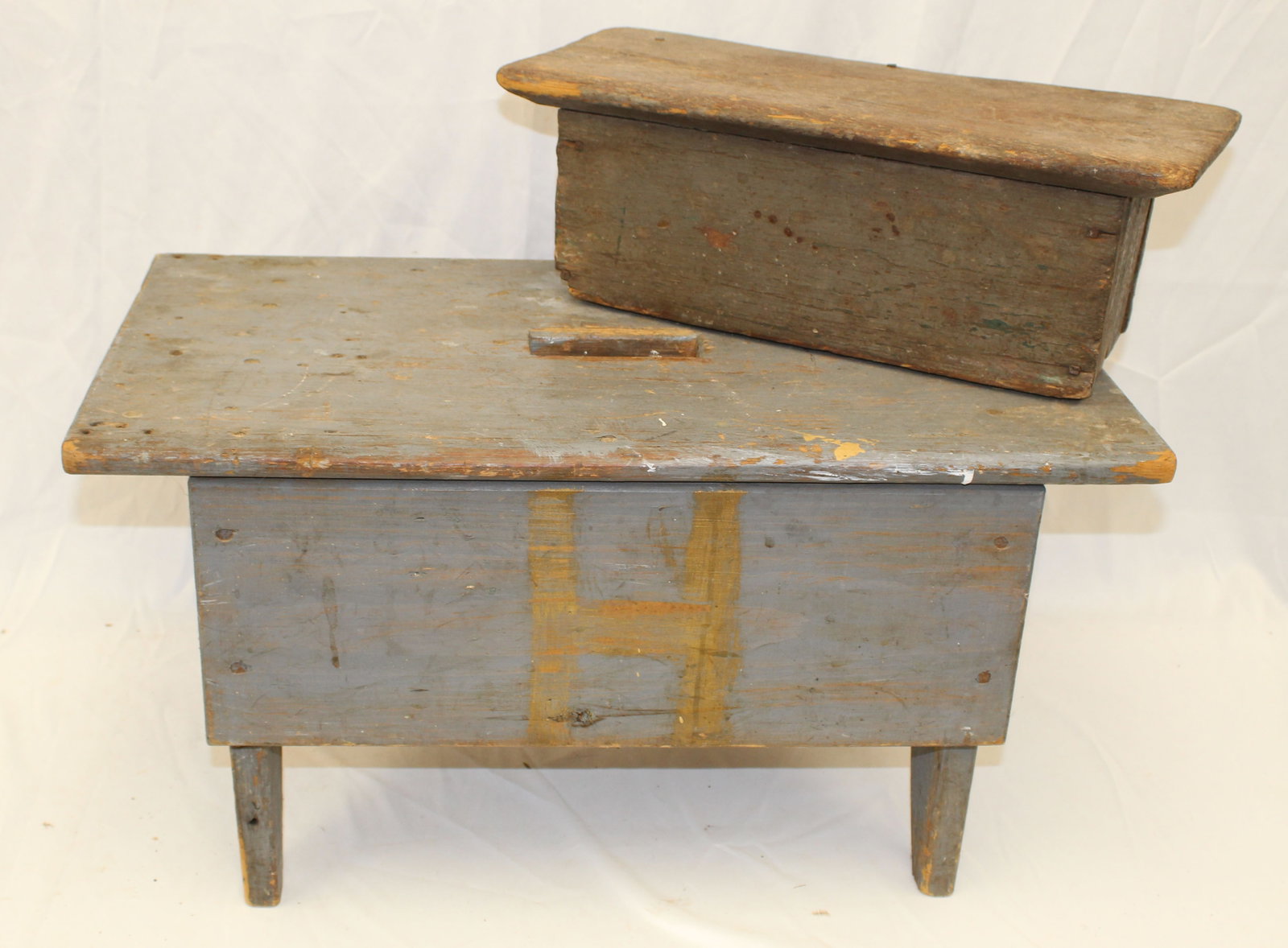 Lot of 2 antique stools incl large w cut out handle in top in gray & a small one in green that could: Lot of 2 antique stools incl large w cut out handle in top in gray & a small one in green that could be a hatchel cover - 12 1/2" tall x 24" wide x 12 1/2" deep & 6 1/2" tall x 16 1/2" wide x 6 1/2" d