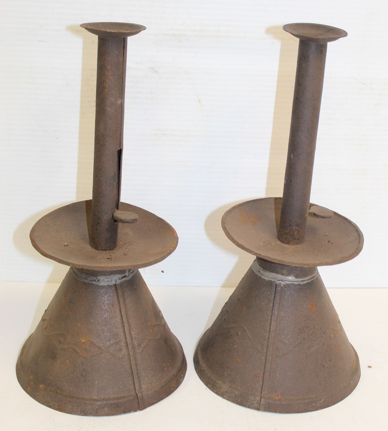 Pair of tin sand weighted candlesticks - 11 1/2" tall x 5 1/2" at base: Pair of tin sand weighted candlesticks - 11 1/2" tall x 5 1/2" at base