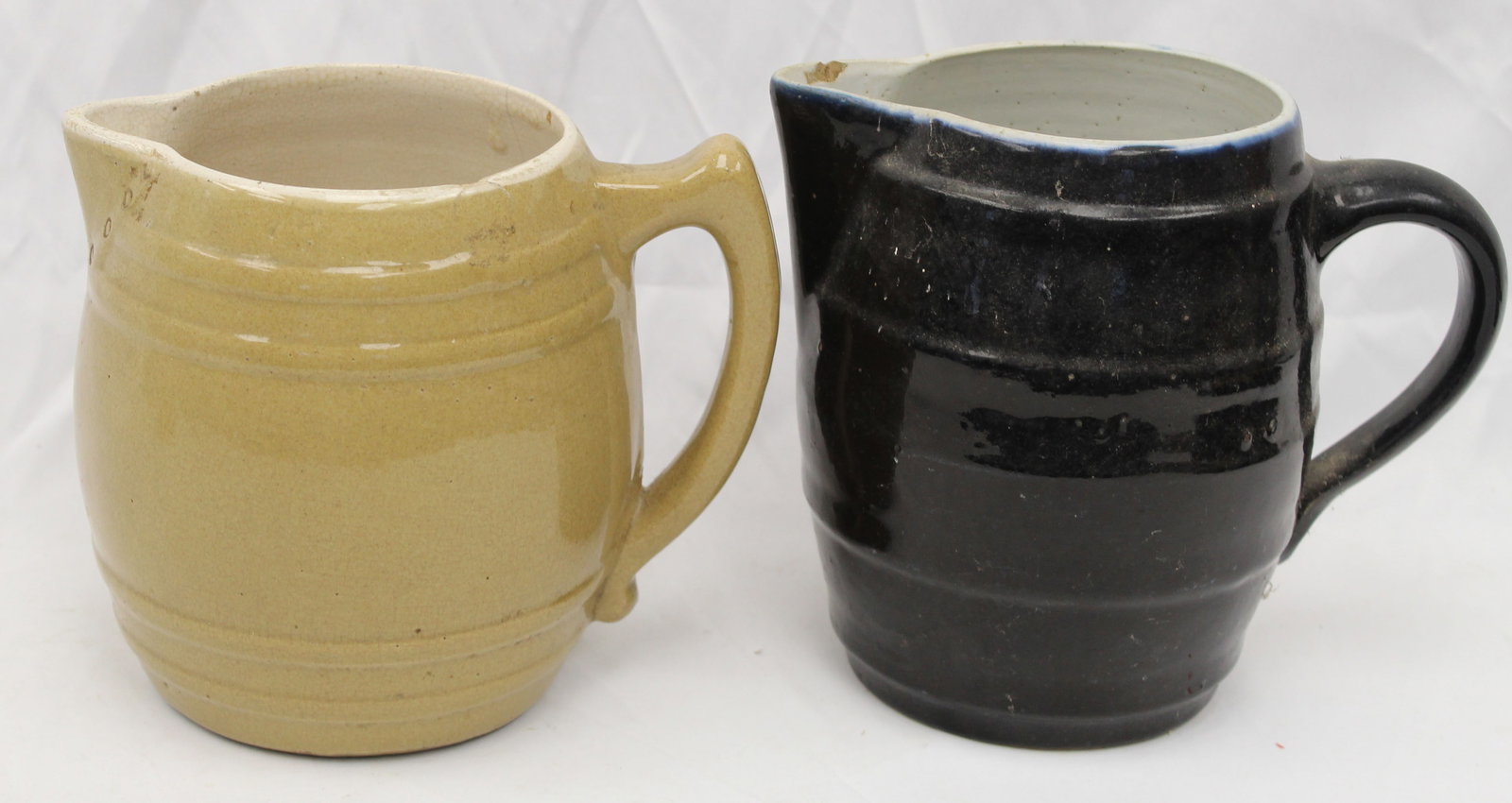 Lot of 2 stoneware pitchers - 7 1/4" & 8" tall: Lot of 2 stoneware pitchers - 7 1/4" & 8" tall