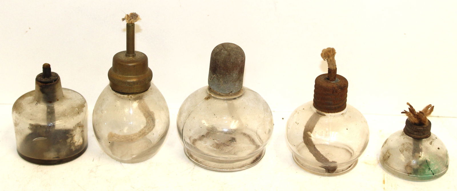 Lot of 5 antique small glass whale oil lamps - 1 3/4" - 4 3/4" tall: Lot of 5 antique small glass whale oil lamps - 1 3/4" - 4 3/4" tall