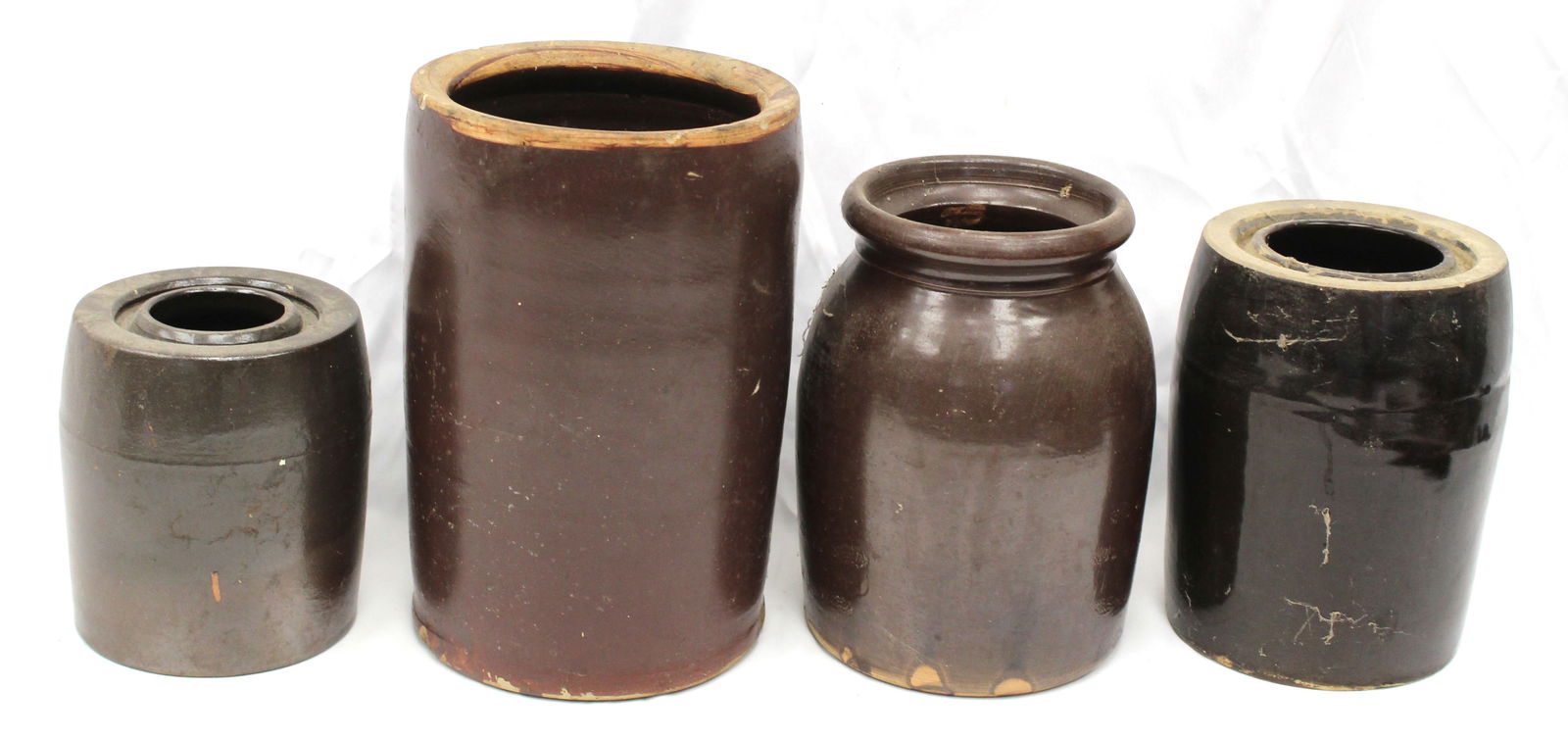 Lot of 4 stoneware jars - 5 1/2", 7 1/4", 8" & 9 1/4" tall: Lot of 4 stoneware jars - 5 1/2", 7 1/4", 8" & 9 1/4" tall