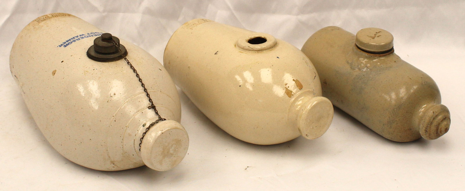 Lot of 3 stoneware hot water bottles/warmers incl 2 marked Dorchester Pottery Works Boston, MA - 9",: Lot of 3 stoneware hot water bottles/warmers incl 2 marked Dorchester Pottery Works Boston, MA - 9", 10" & 12" long