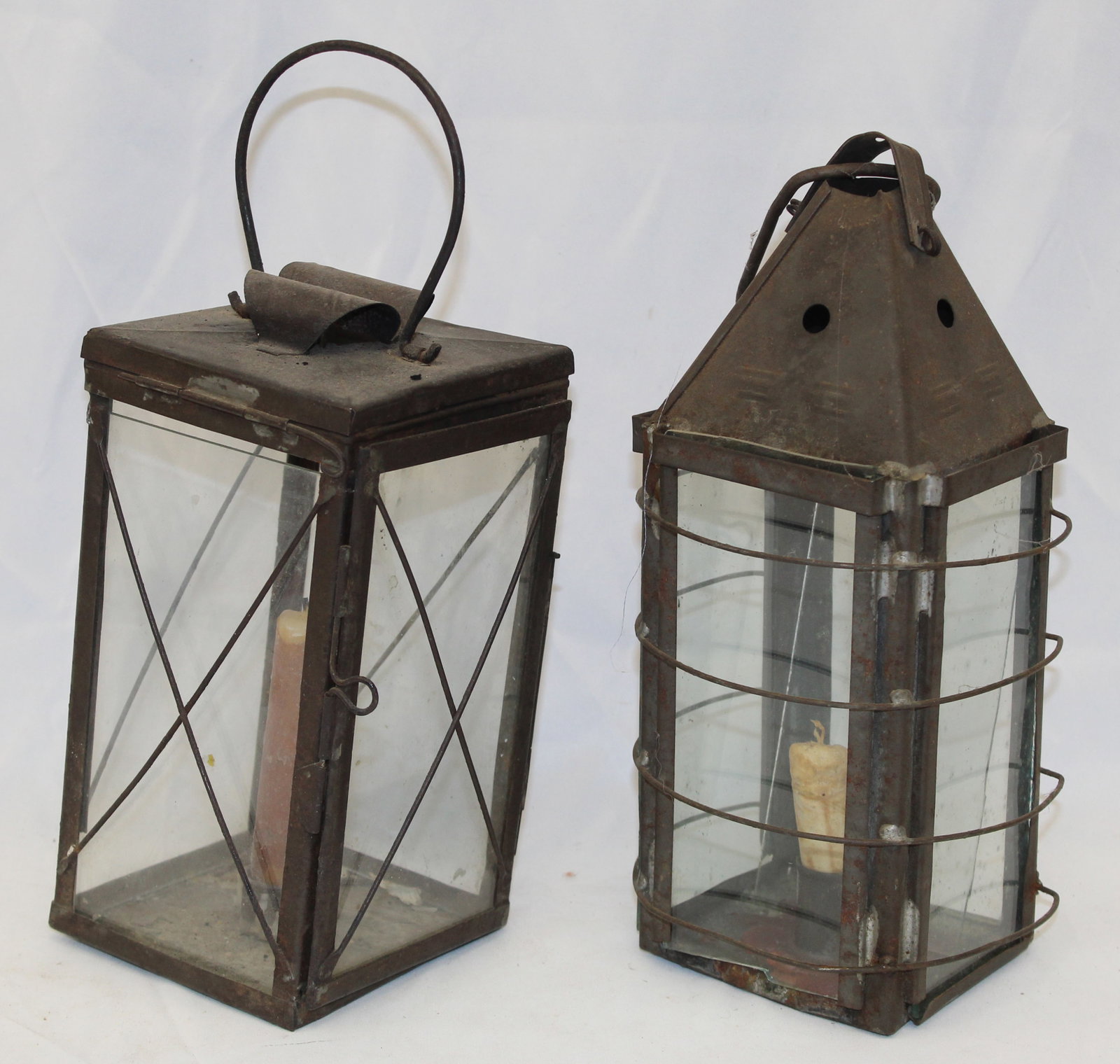 Lot of 2 tin & glass lanterns - 12" & 9" tall: Lot of 2 tin & glass lanterns - 12" & 9" tall