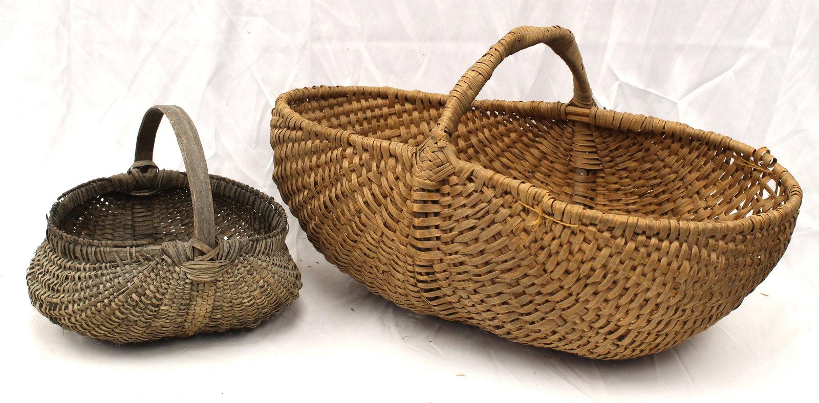 Lot of 2 antique fixed handled melon baskets - 10"x10"x10" & 13"x25"x14": Lot of 2 antique fixed handled melon baskets - 10"x10"x10" & 13"x25"x14"