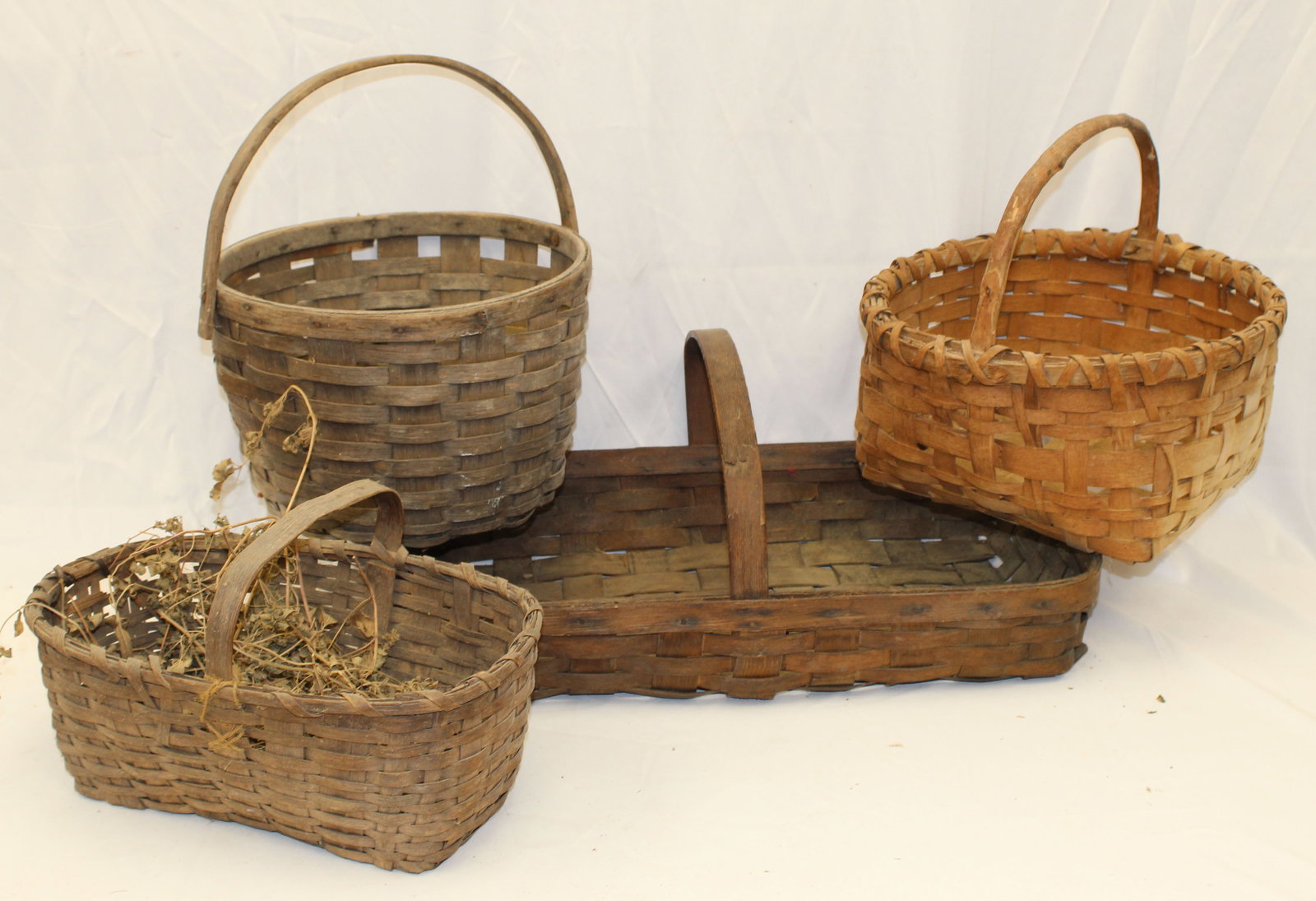 Lot of 4 antique baskets - 9"x15"x9"fixed handled, 9"x12" diam swing handled, 9" x 24" x 13": Lot of 4 antique baskets - 9"x15"x9"fixed handled, 9"x12" diam swing handled, 9" x 24" x 13" gathering & 12 1/2"x13" diam fixed handled