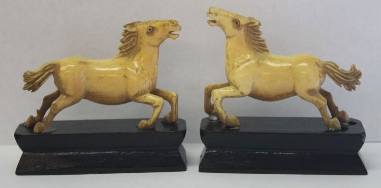 pr of Chinese carved ivory horses on stands in ori: pr of Chinese carved ivory horses on stands in orig box - 2 1/2" long