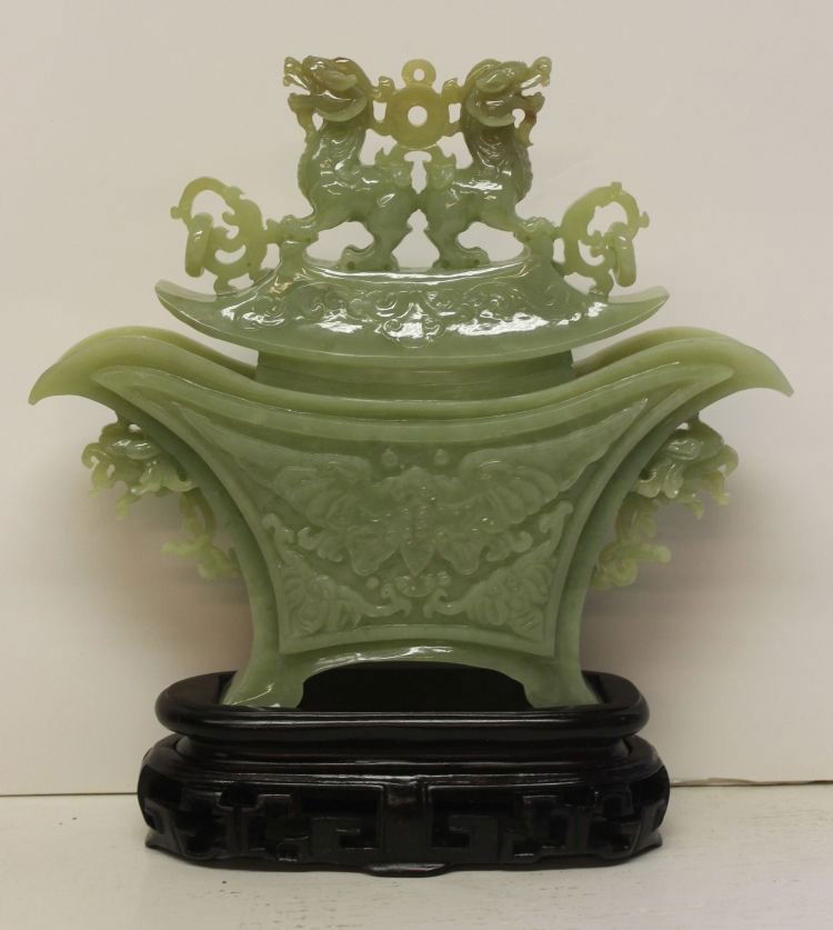 Chinese lg carved jade covered urn on stand in ori: Chinese lg carved jade covered urn on stand in orig box - 9 3/4" overall height x 9 1/4" wide