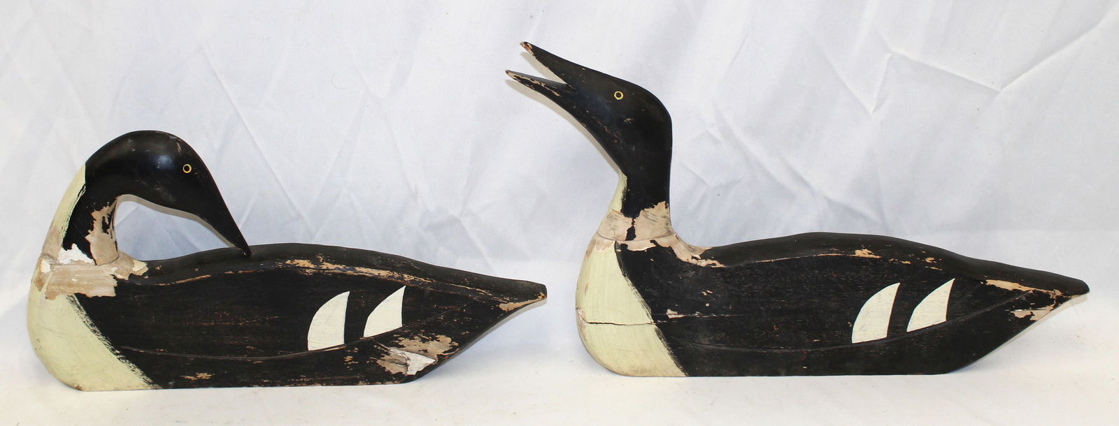 Lot of 2 carved wood & painted flat sided loon decoys (1 of 7)