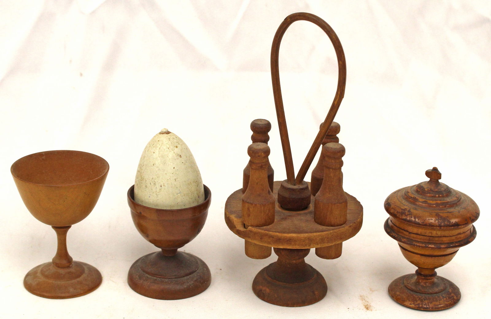 Lot of 4 small treen items incl egg cups, miniature cruet set, and small covered compote: Lot of 4 small treen items incl egg cups, miniature cruet set, and small covered compote