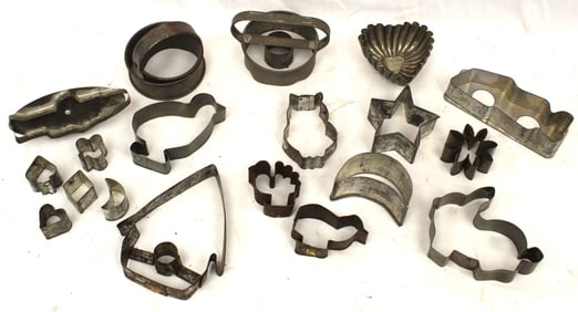 Lot of 18 tin cookie cutters plus a heart shaped candy mold