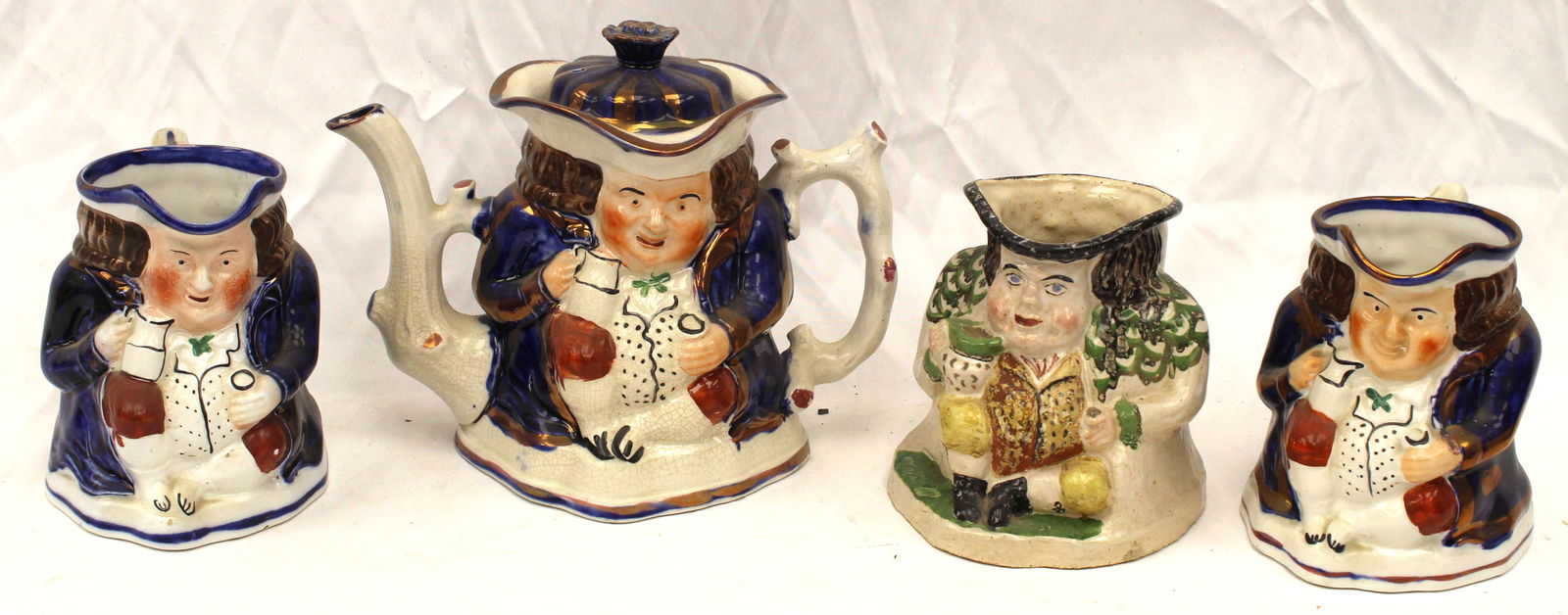 Lot of 4 Staffordshire Toby items incl 3 mugs & a teapot (1 of 5)