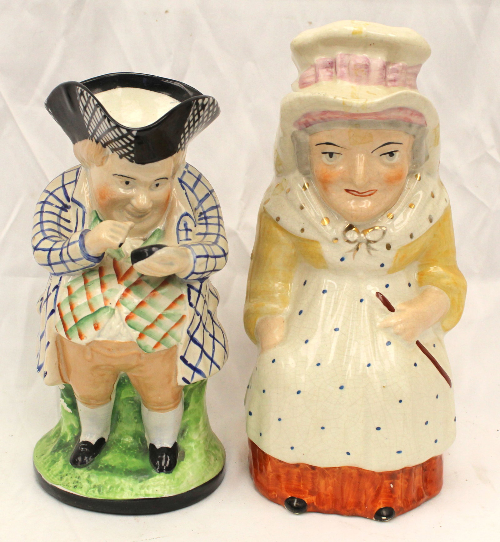 Lot of 2 Staffordshire Toby figural mugs -: Lot of 2 Staffordshire Toby figural mugs -