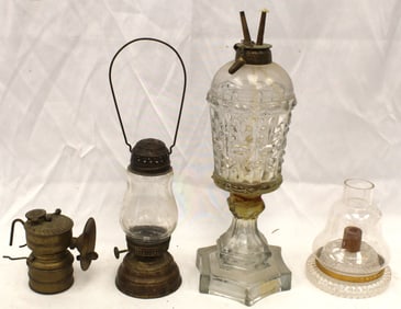 Antique lighting lot incl small brass oil lamp, skater's lantern, glass whale oil lamp & a glass