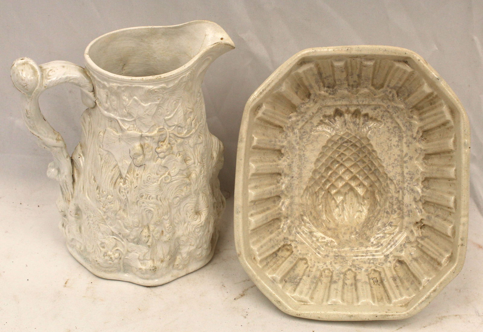 Antique salt glaze pitcher w figural relief dec together w an ironstone pudding mold (1 of 4)