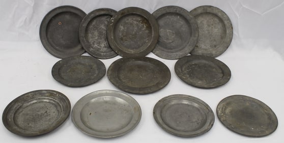 Lot of 12 antique pewter plates - approx 8"-9 1/2" diam