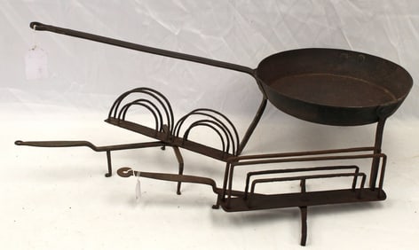 Antique cast iron long handled spider (12 1/2" diam) together w 2 iron toasters