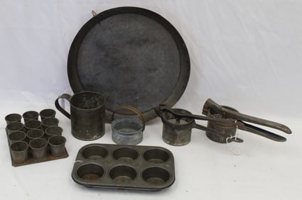 Lot of tin cookware/kitchen lot incl muffin tin, pudding mold, 2 presses, large round shallow pan &