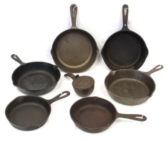 Lot of 7 small cast iron skillets