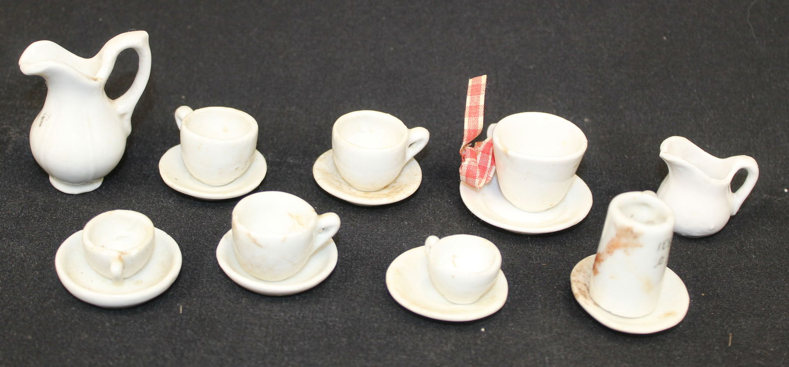 Miniature ironstone lot of 7 cups & saucers plus a pitcher & creamer (1 of 4)