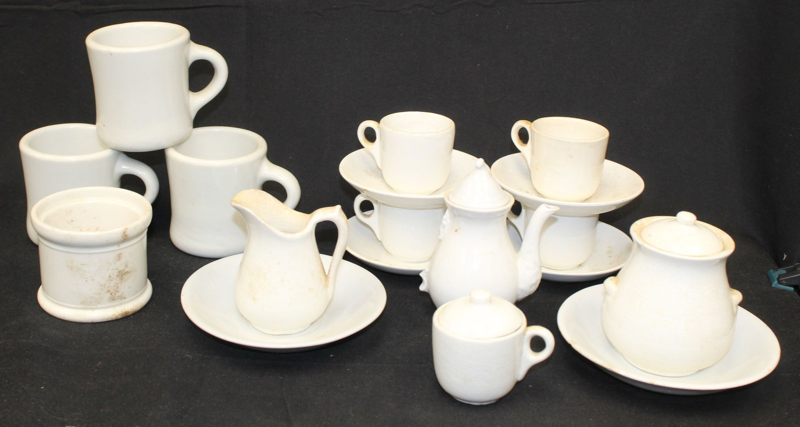 Lot of 18 pieces of ironstone incl cups, mugs & saucers, teapot creamer & sugars: Lot of 18 pieces of ironstone incl cups, mugs & saucers, teapot creamer & sugars