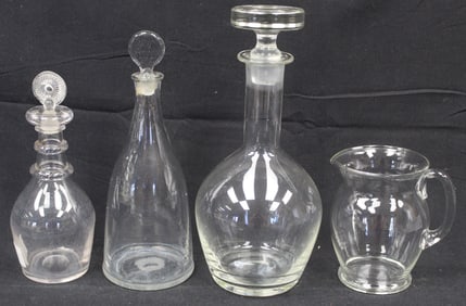 Lot of 4 early clear glass decanters w stoppers plus a pitcher