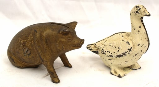 Lot of 2 cast iron still banks - pig & duck - 3" & 4" tall