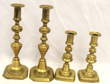 Lot of 2 pairs of brass candlesticks - 7" & 10" tall