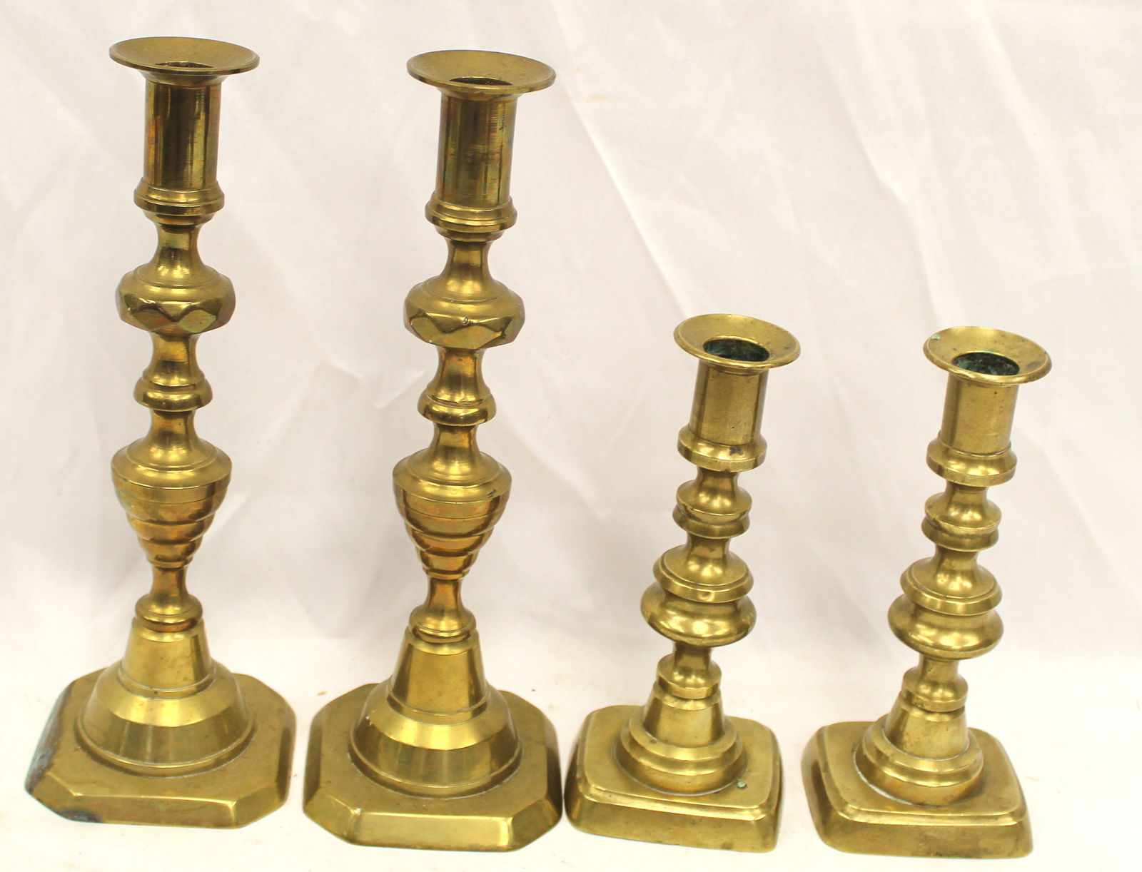 Lot of 2 pairs of brass candlesticks - 7" & 10" tall (1 of 5)