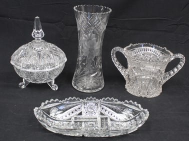 Lot of 4 pcs of cut glass items incl vase, covered candy dish, handled vase & celery - tallest vase