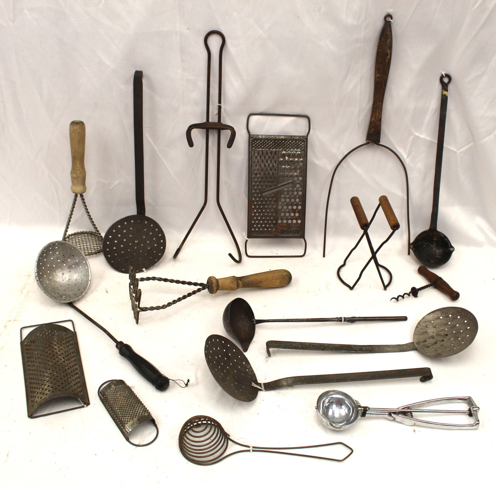 Lot of antique kitchen tools incl spoons, graters, scoops, forks etc (1 of 7)