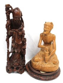 Lot of 2 carved wooden Asian figural sculptures