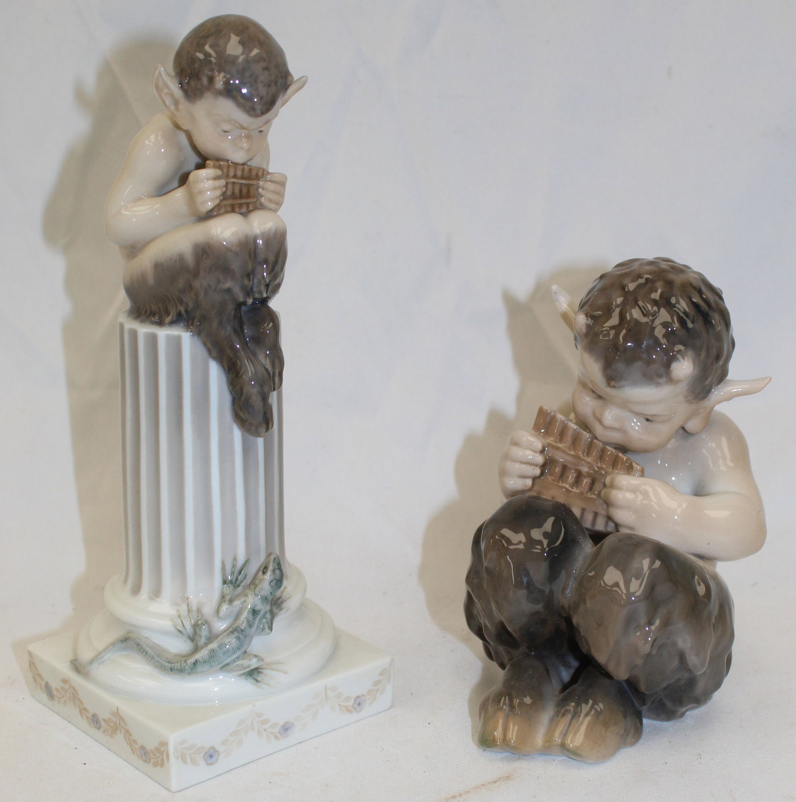 Lot of 2 Royal Copenhagen porcelain figural fauns: Lot of 2 Royal Copenhagen porcelain figural fauns