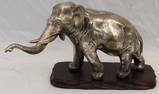 Silvered elephant scupture on stand w Asian mark