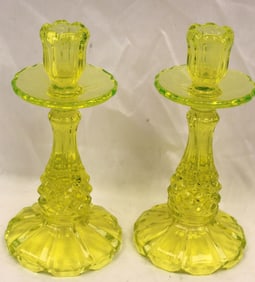 Pair of vaseline glass candlesticks