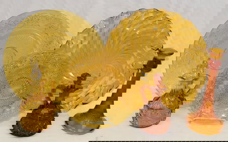 Lot of 6 pieces of amber glass incl chargers, plate, cruets & candlestick