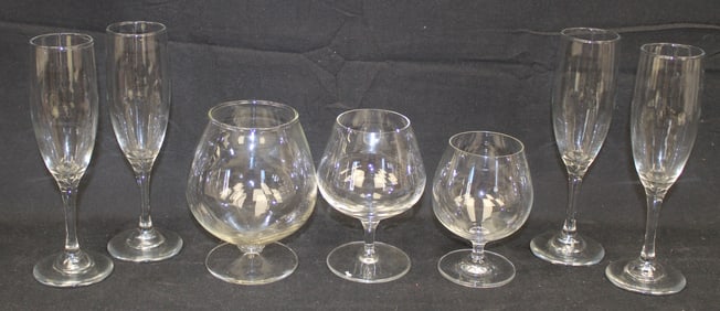 Lot of 7 pieces of glass stemware incl 3 brandy's & 4 champagne flutes