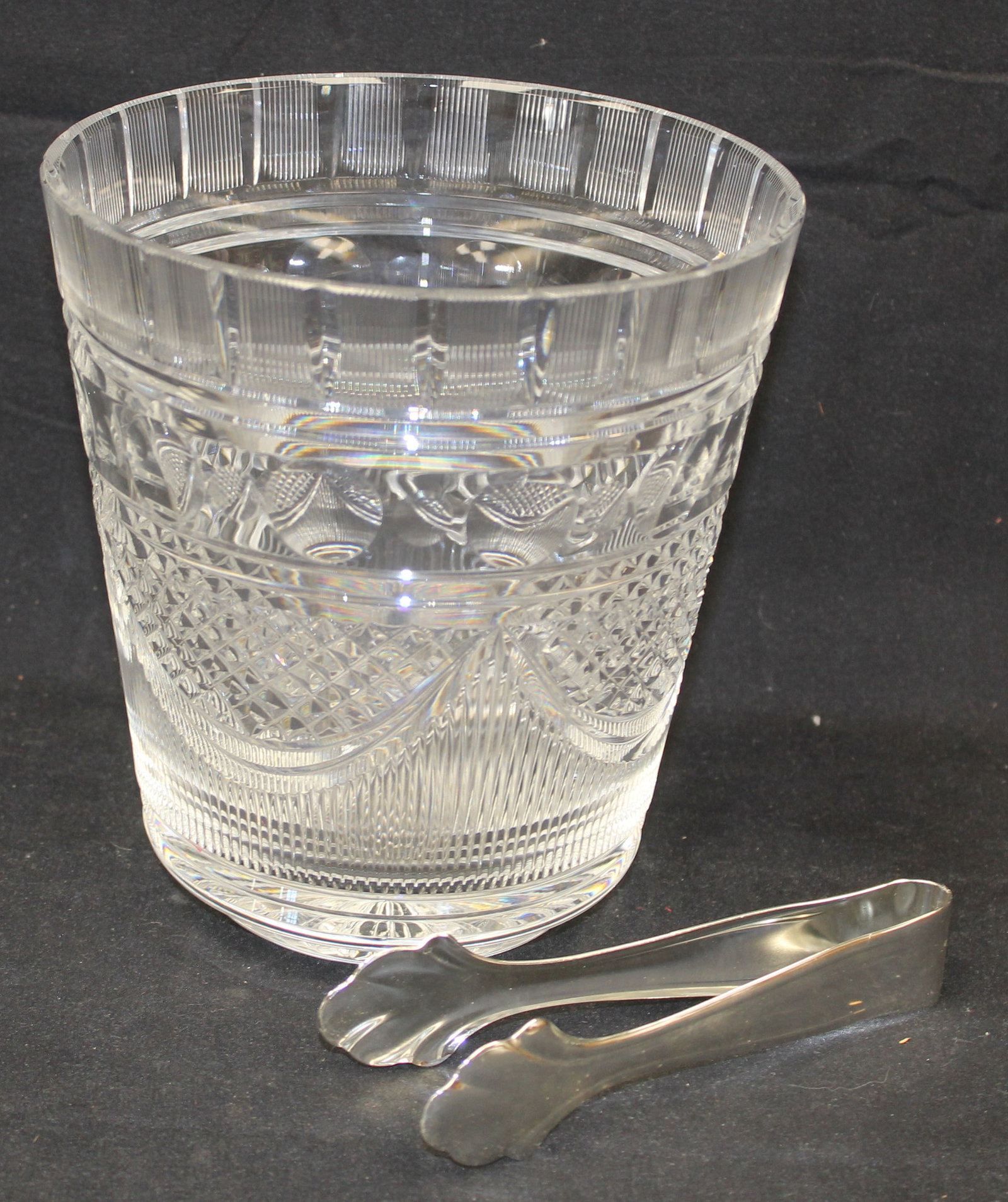 Waterford crystal ice bucket w silver tongs: Waterford crystal ice bucket w silver tongs7 3/8” high x 7” at the top and about 4 3/4” at base