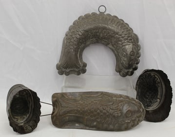 Lot of 4 tin food molds incl fish, flowers & a pineapple - 5 1/4" - 12" long