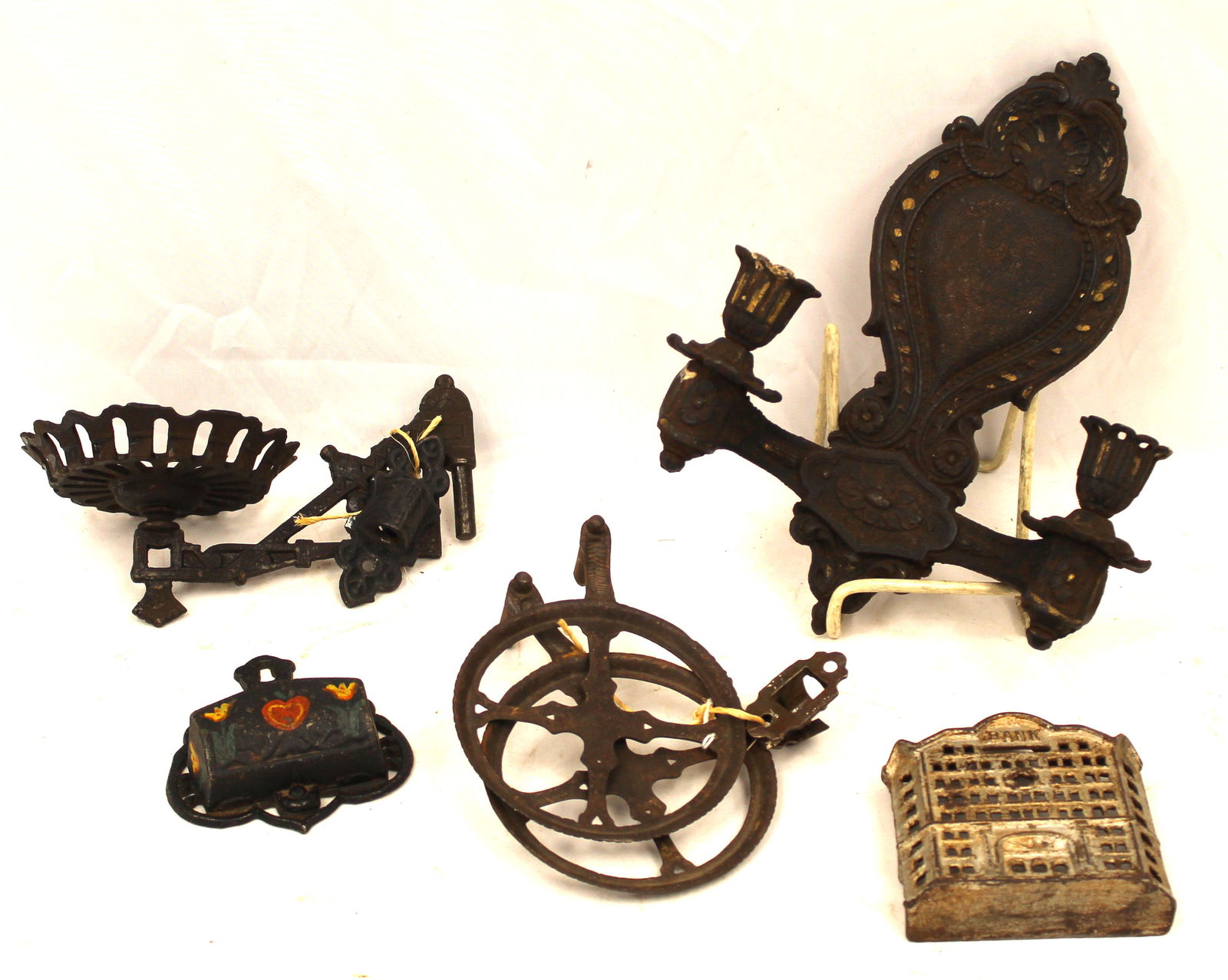 Misc lot of iron incl wall sconces, wall pocket & still bank (1 of 6)